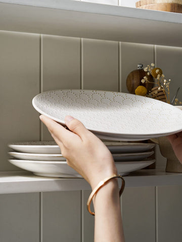 LE TAUCI stackable-design plates save cupboard space.