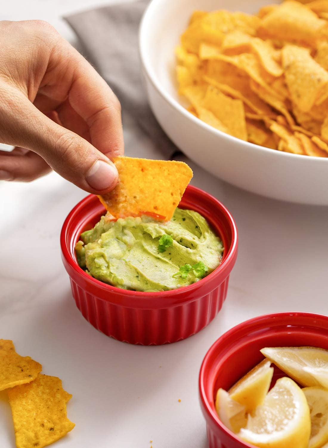 LE TAUCI ramekins ideal for dipping sauces and condiments at gatherings.