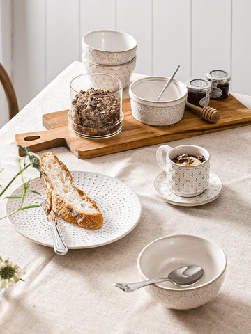 LE TAUCI embossed ceramic espresso cups showing refined texture and grip