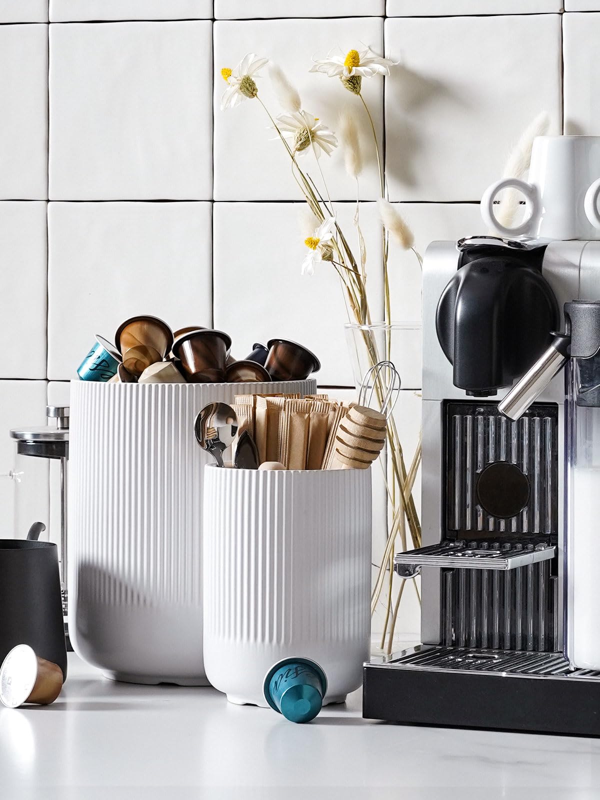 LE TAUCI multiuse holder doubles as a decorative vase and organizer.