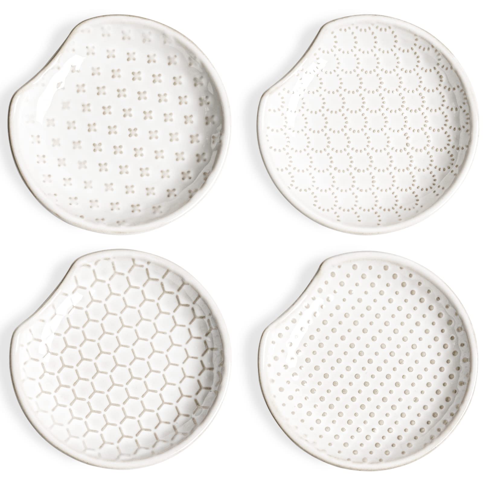 LE TAUCI spoon rest on stove top with embossed designs, catching drips and protecting counters