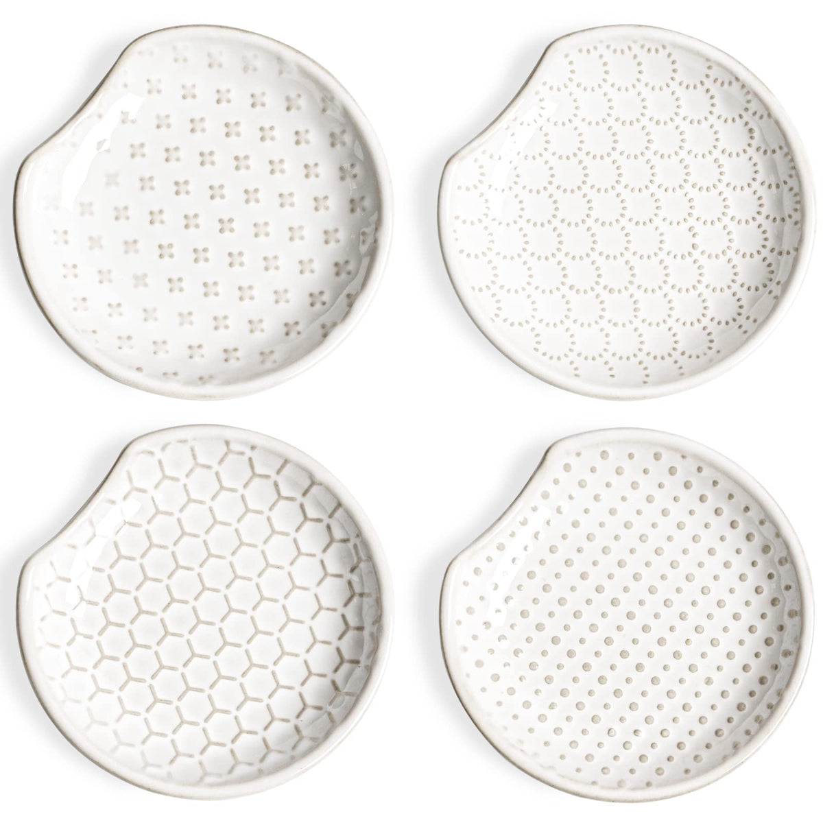LE TAUCI spoon rest on stove top with embossed designs, catching drips and protecting counters
