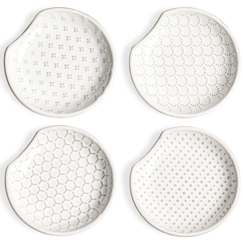 LE TAUCI spoon rest on stove top with embossed designs, catching drips and protecting counters