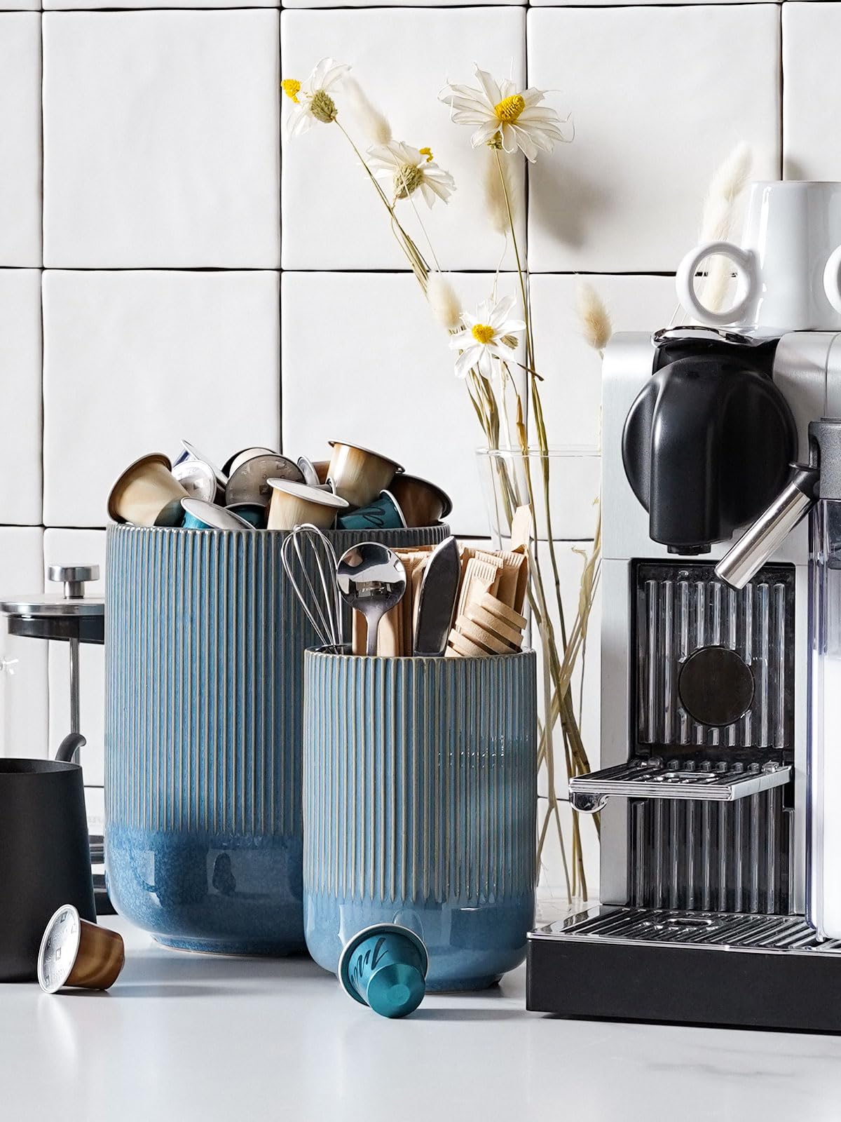 LE TAUCI two-pack on kitchen counter organized for utensils and flatware.