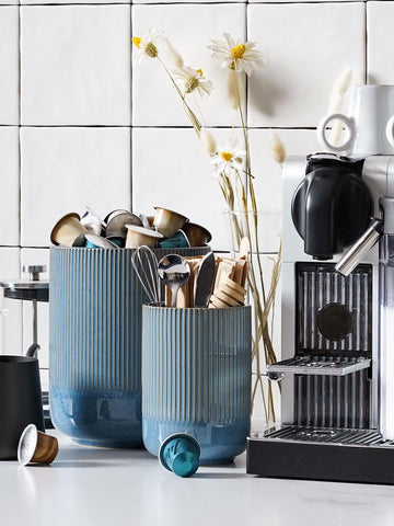 LE TAUCI two-pack on kitchen counter organized for utensils and flatware.