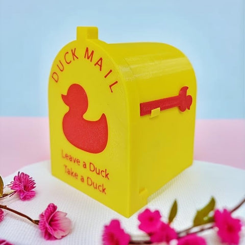 Cruising Duck Mailbox Movable Flag on a door invites shipboard game participation.
