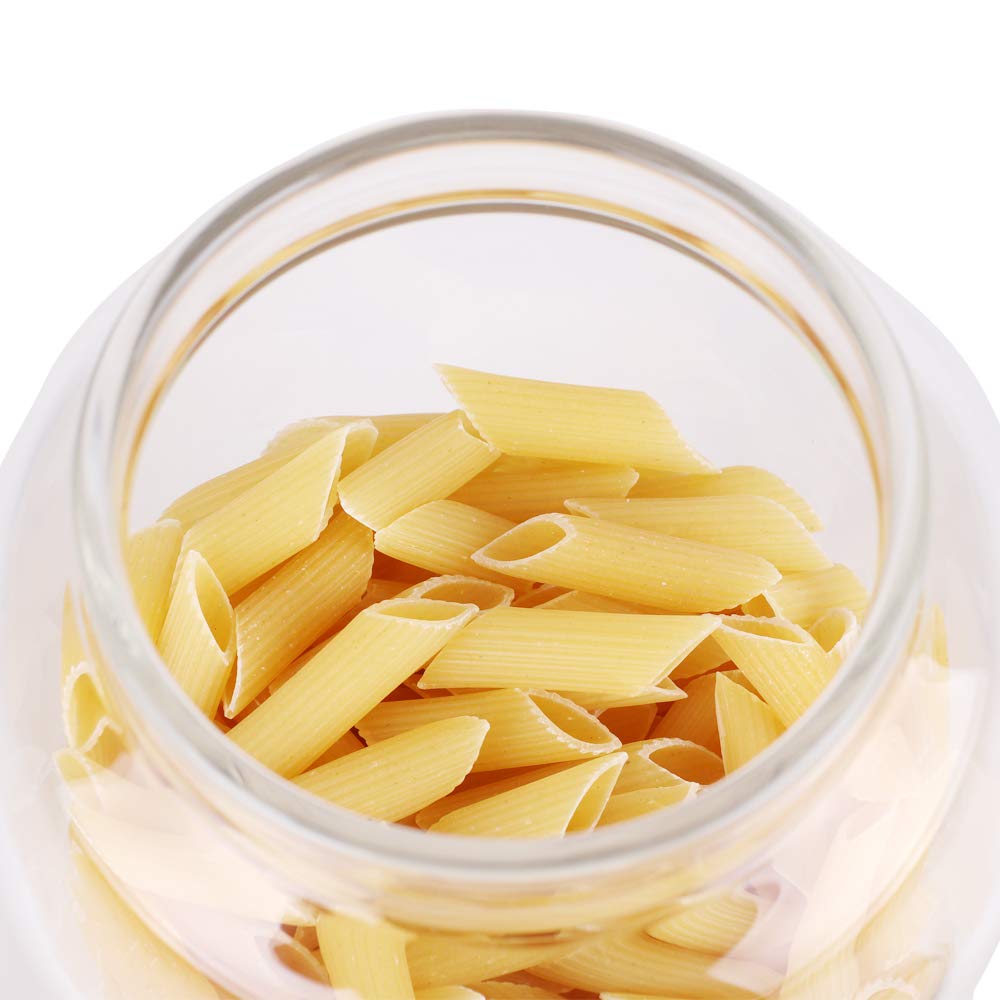 LEAVES AND TREES Y baking-soda jar mirrors organized pantry aesthetics.