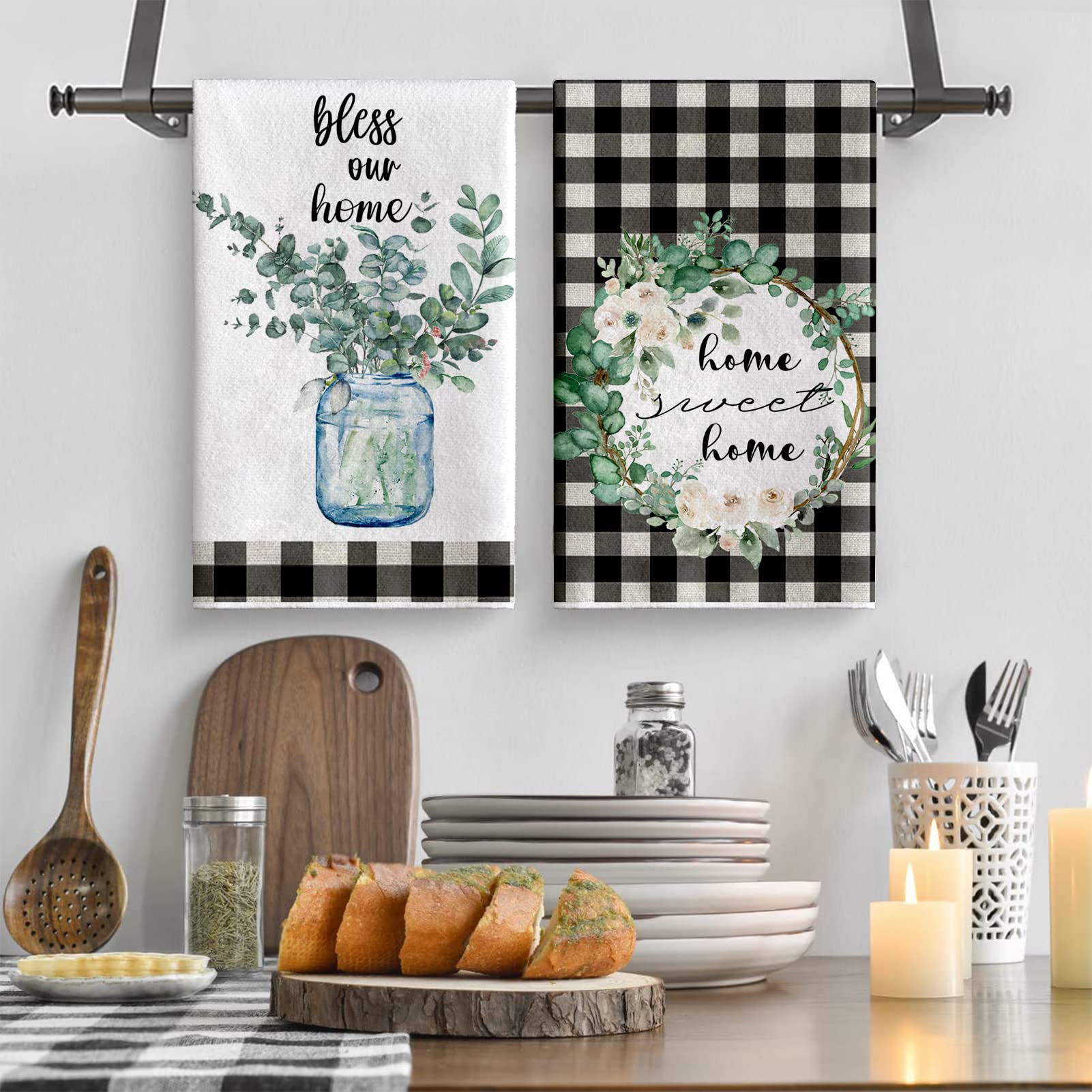 Lebsitey eucalyptus leaves dish towel neatly hangs on oven handle for easy access.