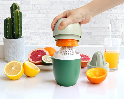 Green Lechin hand juicer design adds bright kitchen appeal.