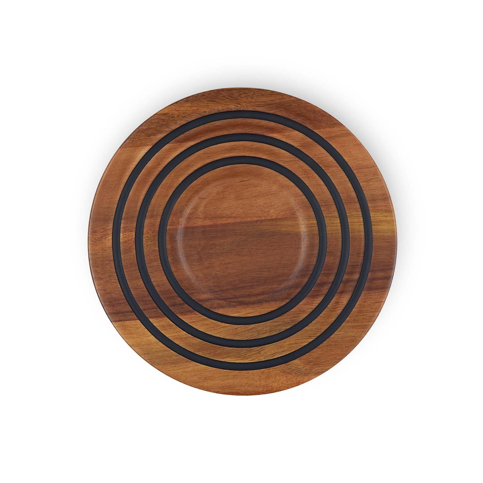 Le Creuset magnetic wooden trivet in acacia wood, heat-safe base for cookware.
