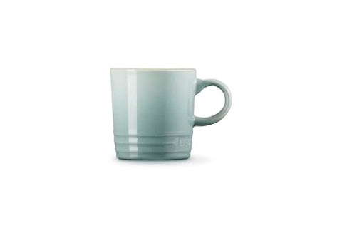 Le Creuset espresso mug sea salt nonporous glaze resists stains and scratches.