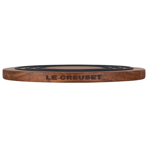 Le Creuset magnetic attachment helps transfer warm cookware from oven to table.