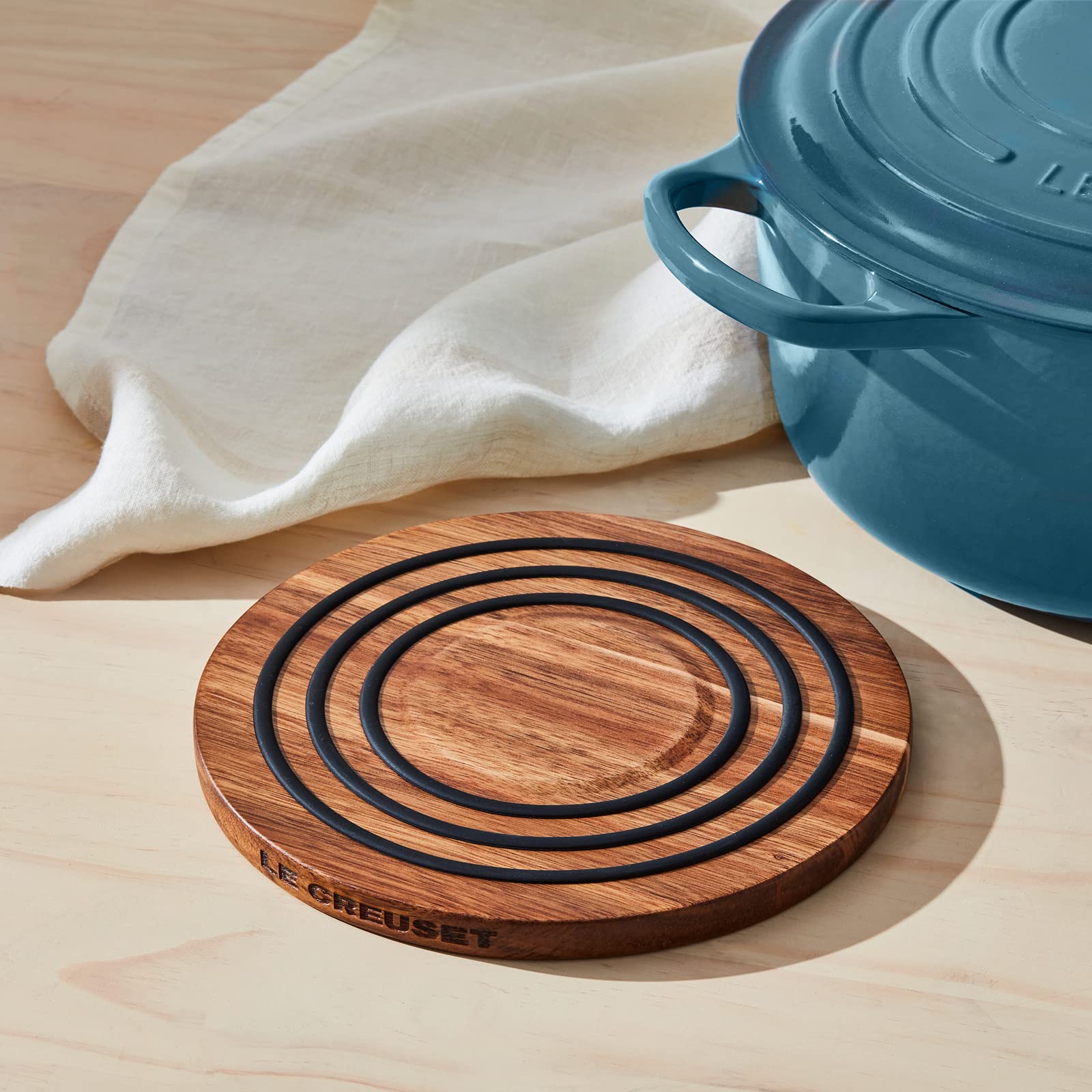Le Creuset acacia wood grain detail adds natural beauty and protection.