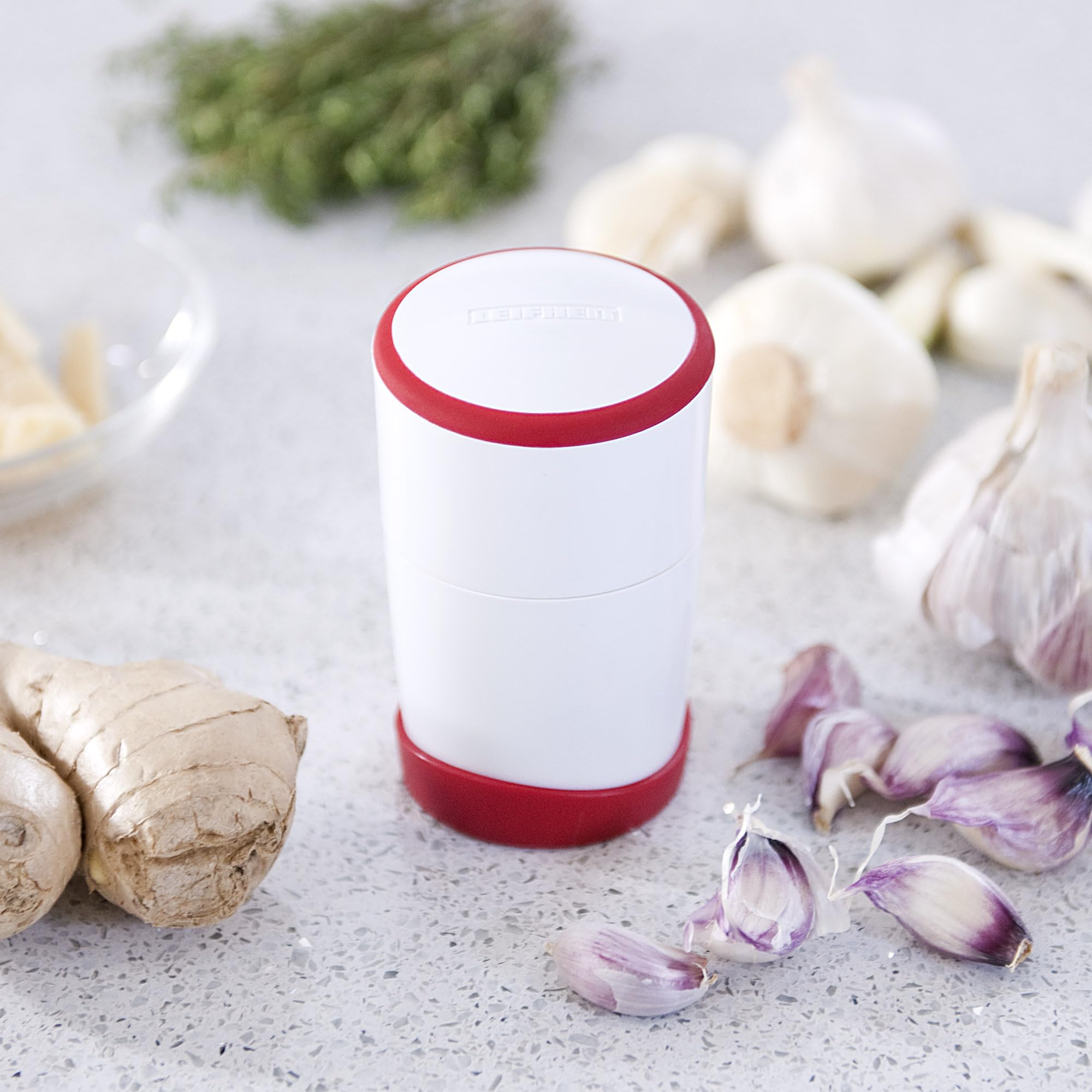 Leifheit Gourmet Garlic Slicer with removable cap protects blades when stored