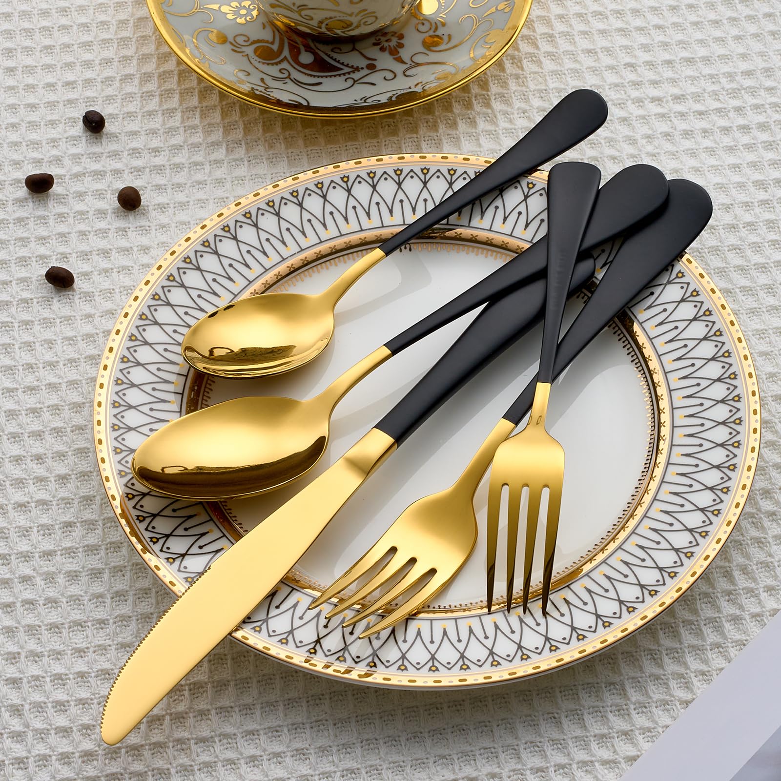 Gift-ready Lekoton gold-black flatware set for weddings or housewarmings
