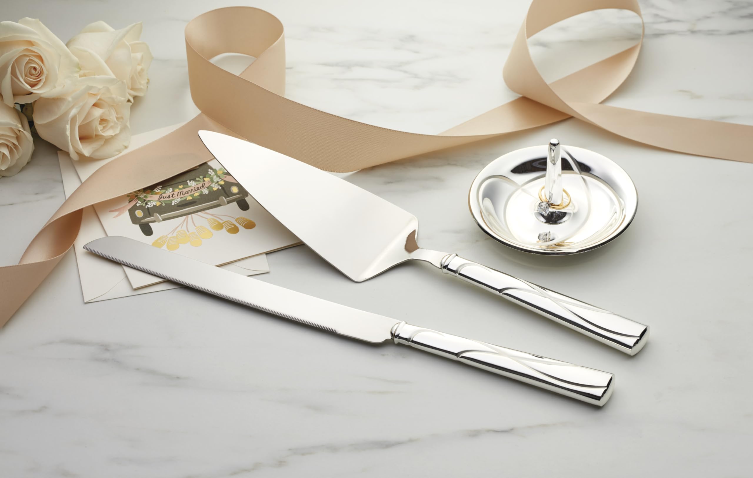Lenox Adorn cake server with interlaced hearts for festive dessert sharing.
