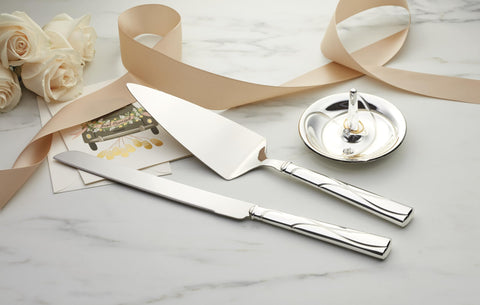 Lenox Adorn cake server with interlaced hearts for festive dessert sharing.