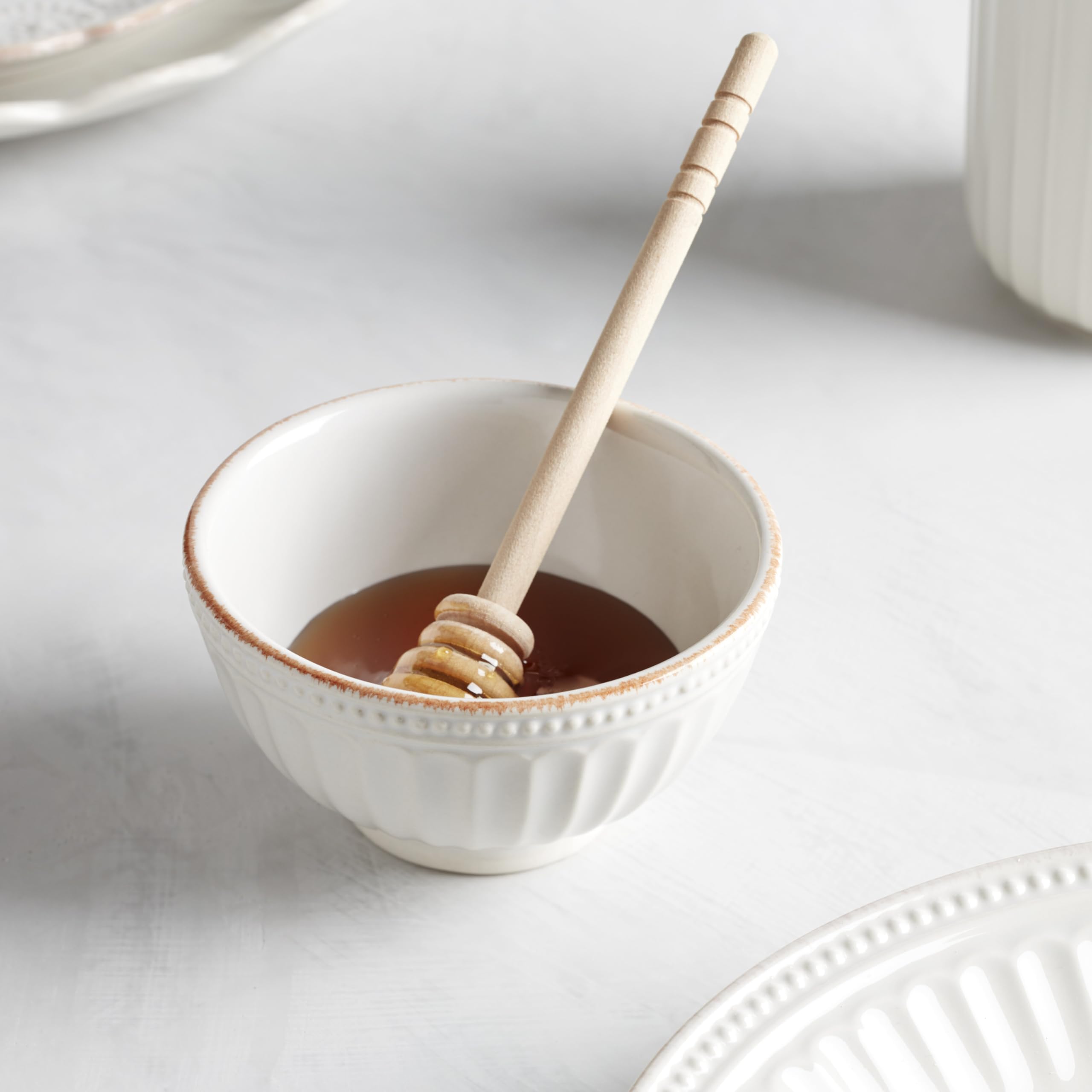 Lenox French Perle Groove mini bowls ready for table use with sauces.