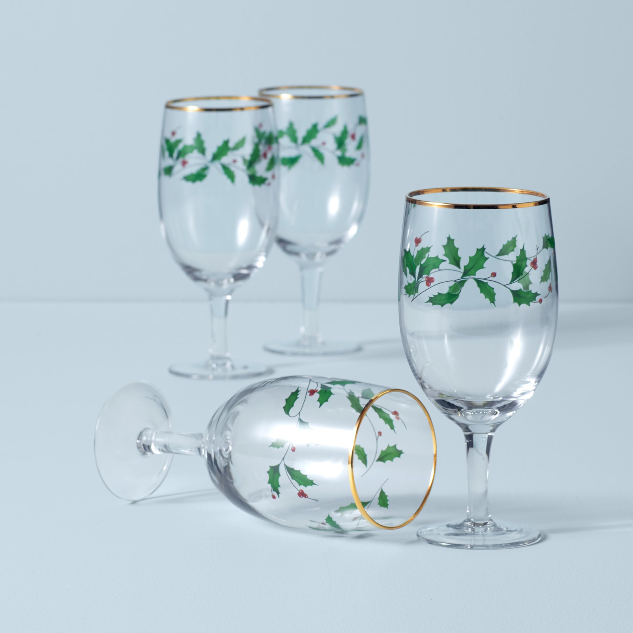 Close-up of holly decal on Lenox glass highlighting festive decoration.