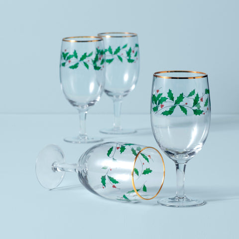 Close-up of holly decal on Lenox glass highlighting festive decoration.