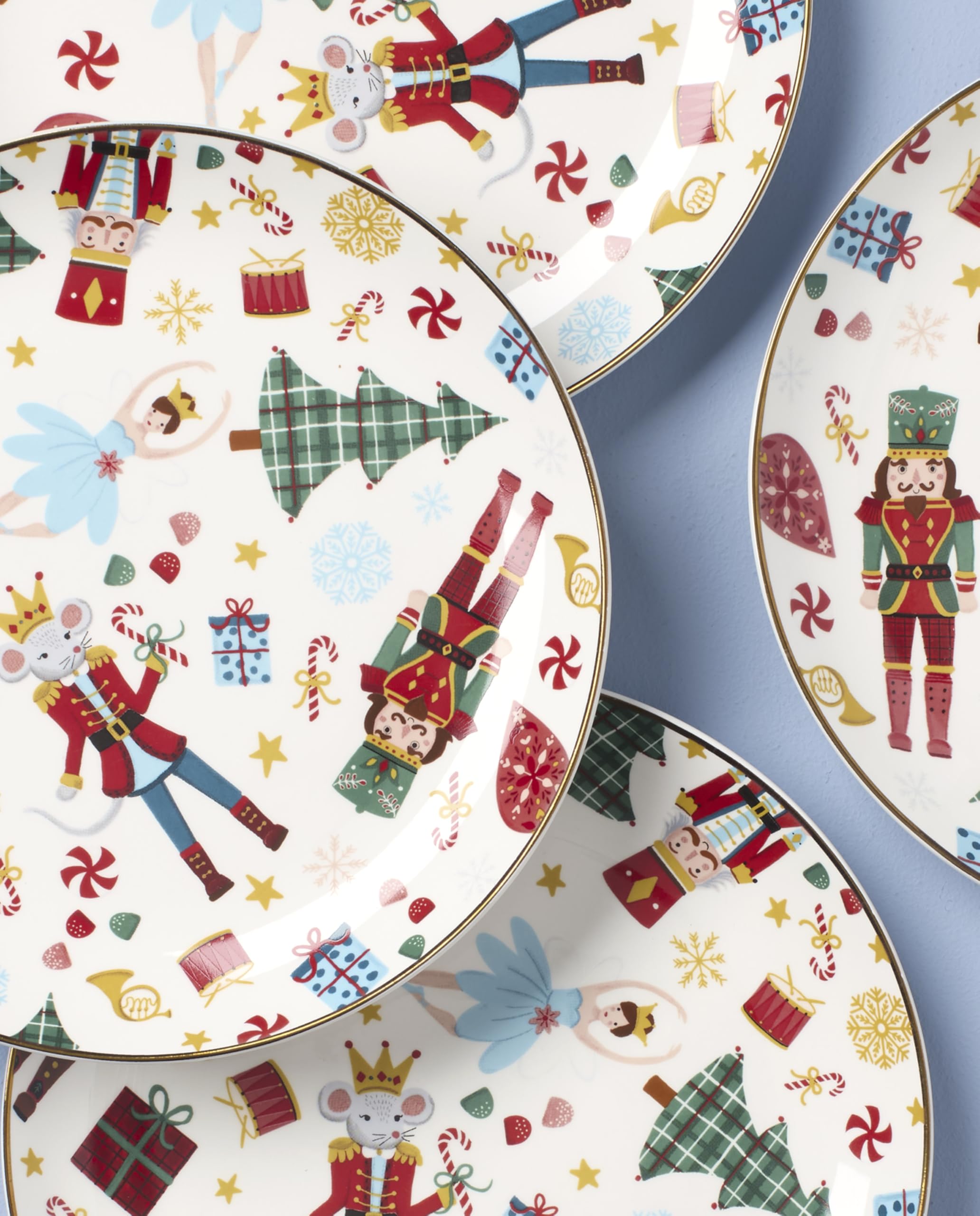 Lenox Nutcracker Ballet plate setting with holiday colors.