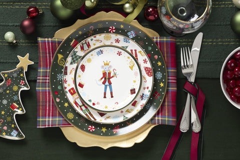 Lenox Nutcracker Ballet plate stacked with dinnerware.