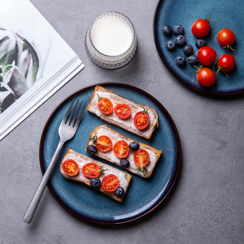 LERATIO modern-shaped plates on kitchen counter with contemporary décor.