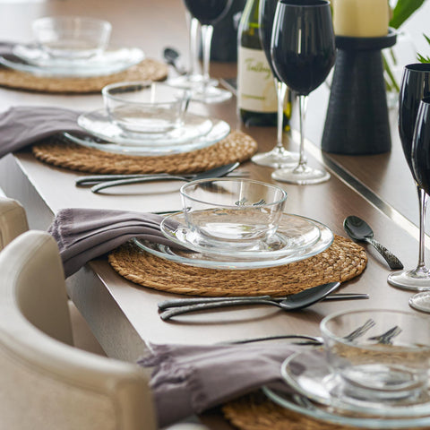 Le'raze 12-piece glass dinnerware on a stylish table setting for an intimate dinner party.