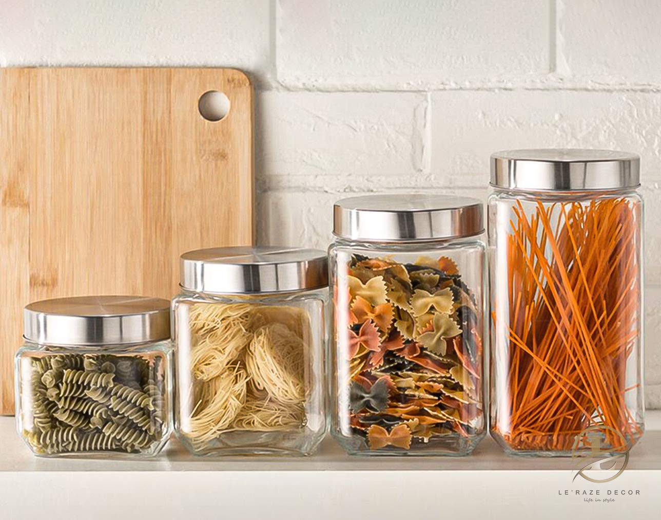 Le'raze canisters on kitchen counter in a modern setup.