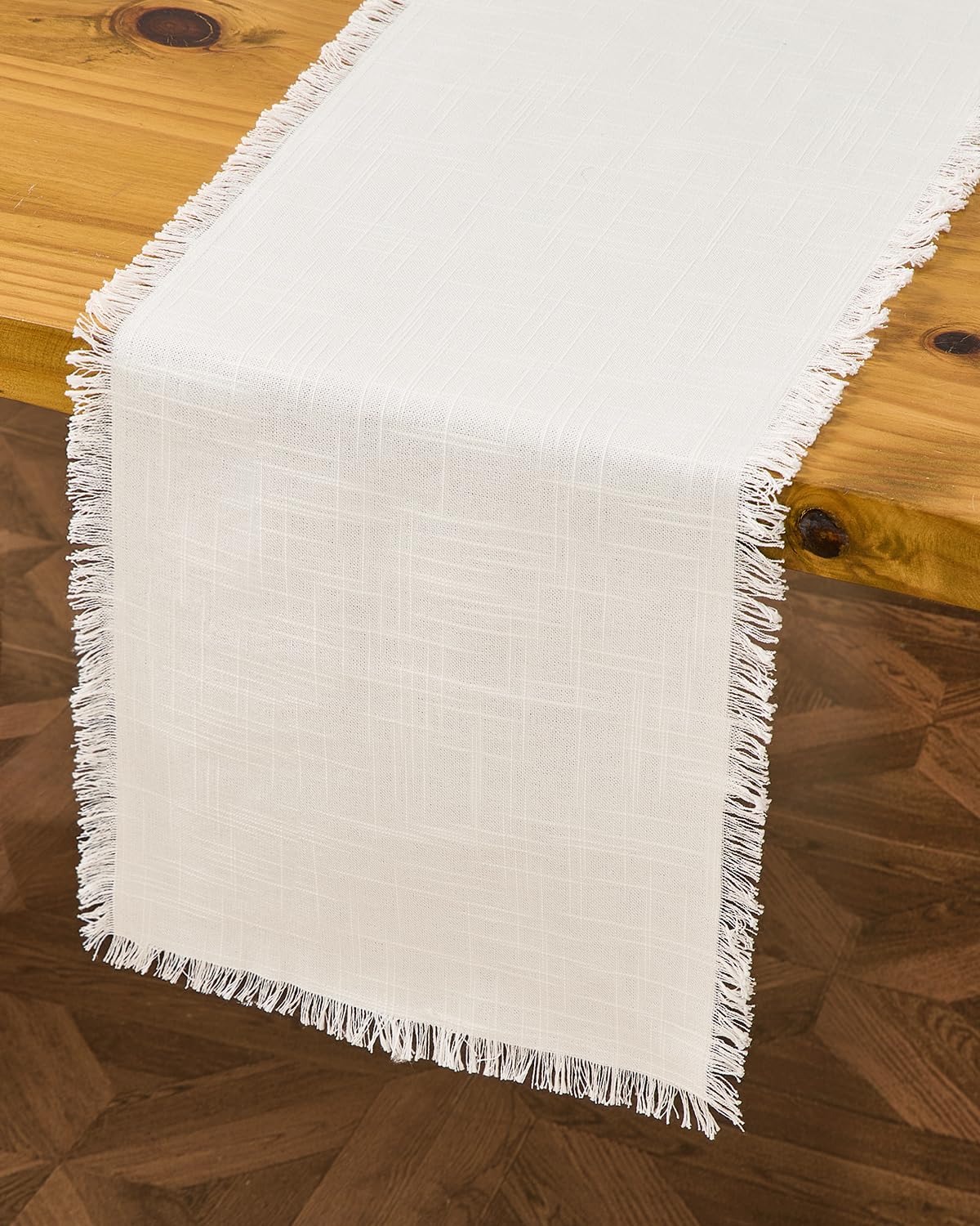 Letjolt white table runner on a casual table setting adds relaxed elegance.