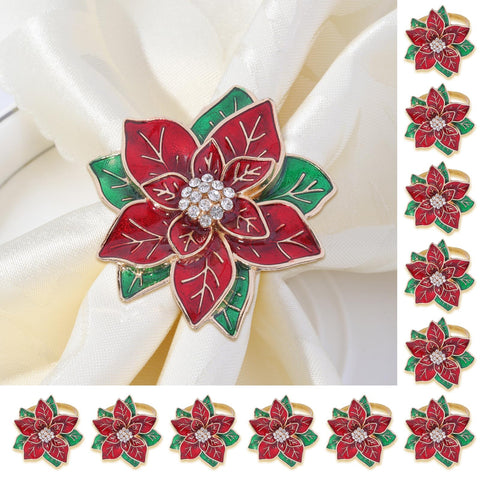 LGJkYF poinsettia napkin ring close-up with festive red petals and polished metal for holiday tables