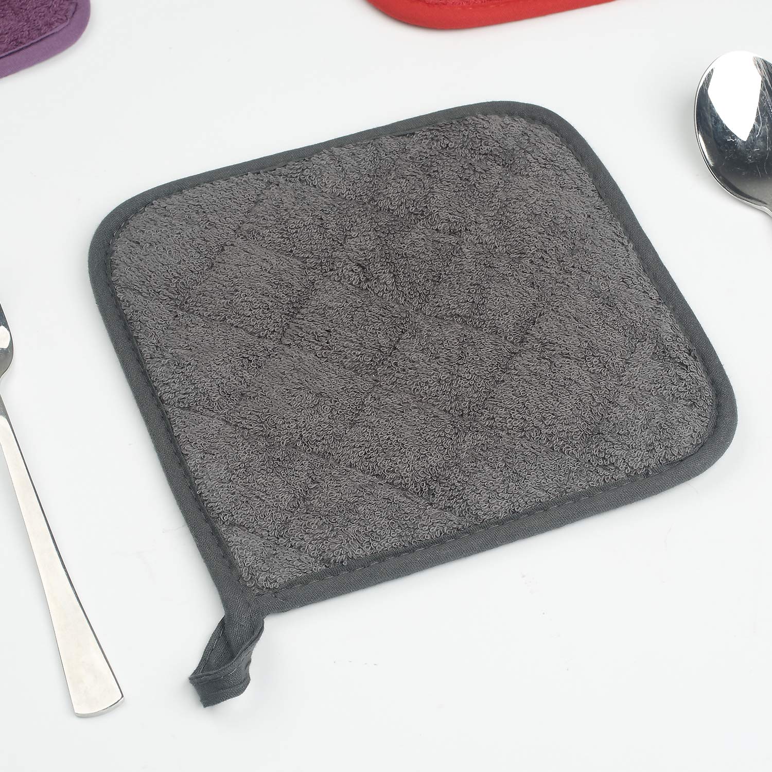 Lifaith microwave-splatter-guard doubles as a convenient spoon rest