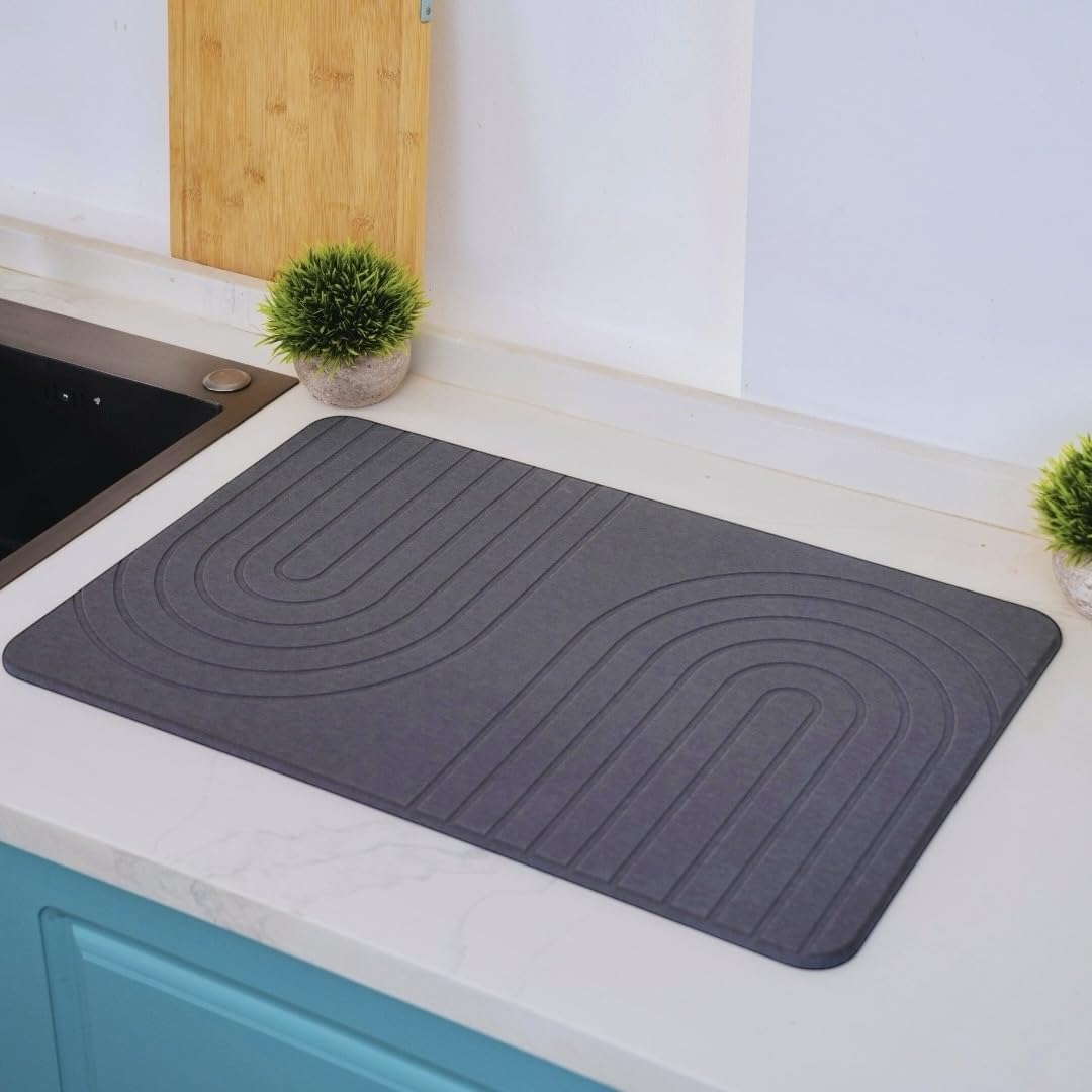 LIFSEZY large stone drying mat on counter demonstrates fast water absorption