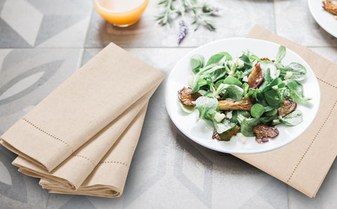 Light & Pro natural flax cotton napkins with durable hemstitched edges.