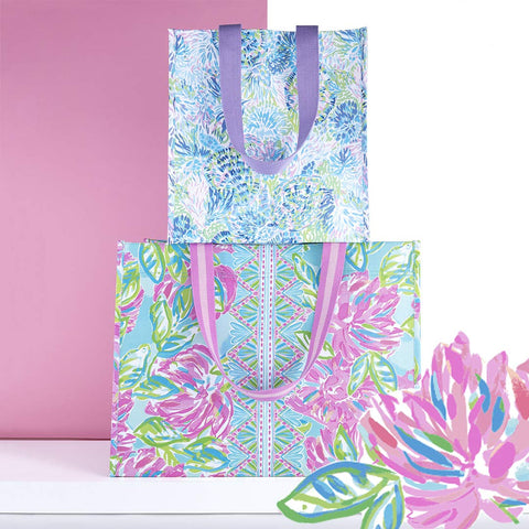 Lilly Pulitzer gold hardware accents add a touch of luxe to the tote.