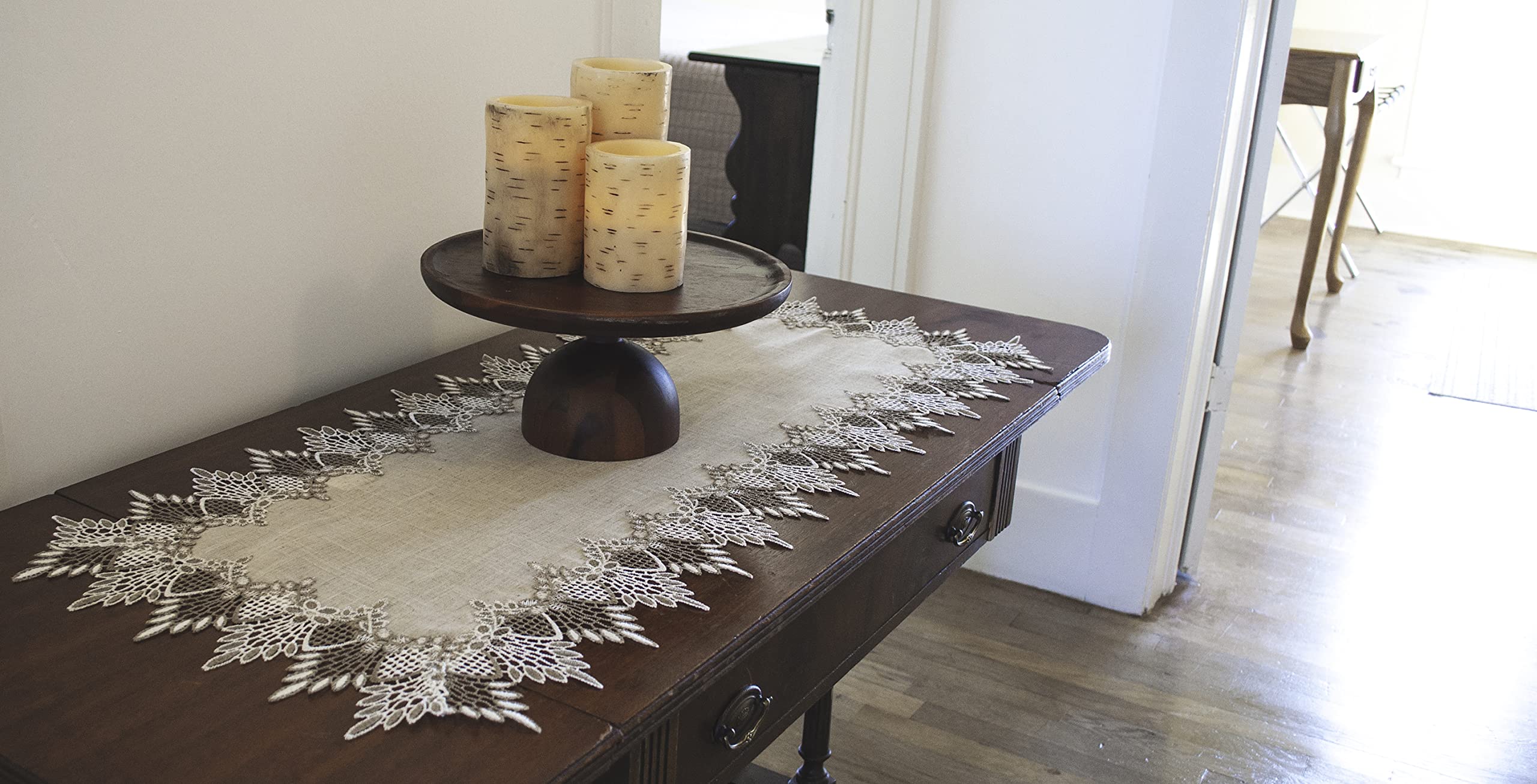 Linens, Art and Things coffee table runner lace adds refined touch.