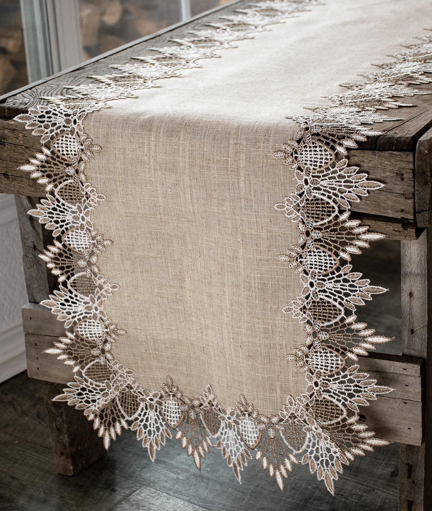 Linens, Art and Things lace runner neutral earth tones enhances a sophisticated dinner table.
