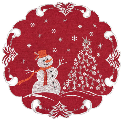 Linens, Art and Things snow doily with silver stars enhances centerpiece sparkle.