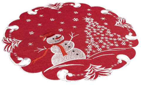 Linens, Art and Things red linen doily with snowman elevates holiday tablescape.