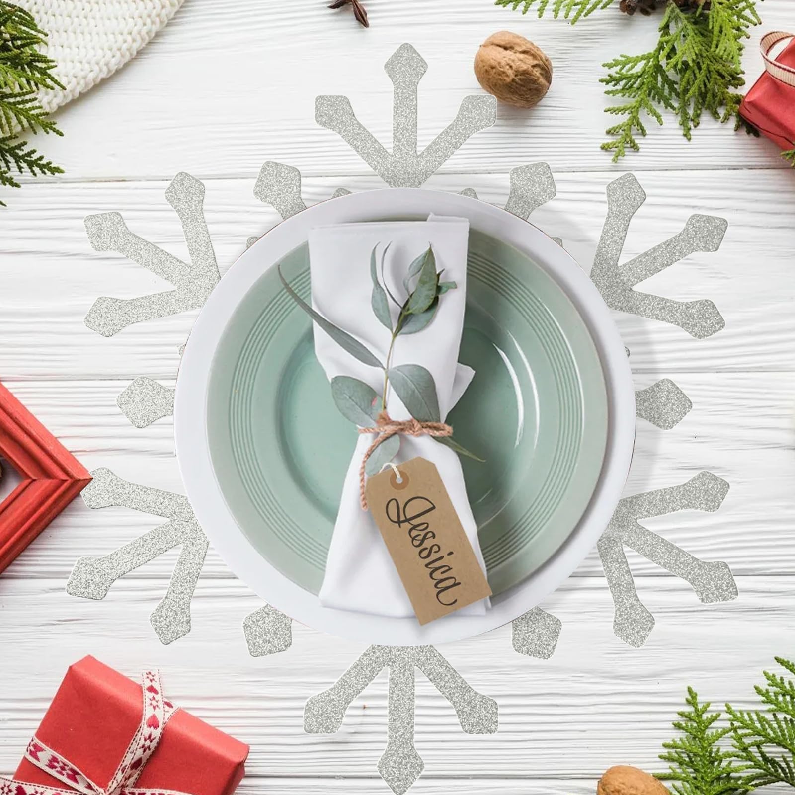 Lingringdcy winter party table featuring gold snowflake placemats