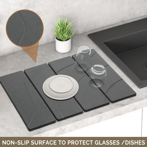 Linidcoud stone drying pad placed under a dish rack keeps countertops dry.