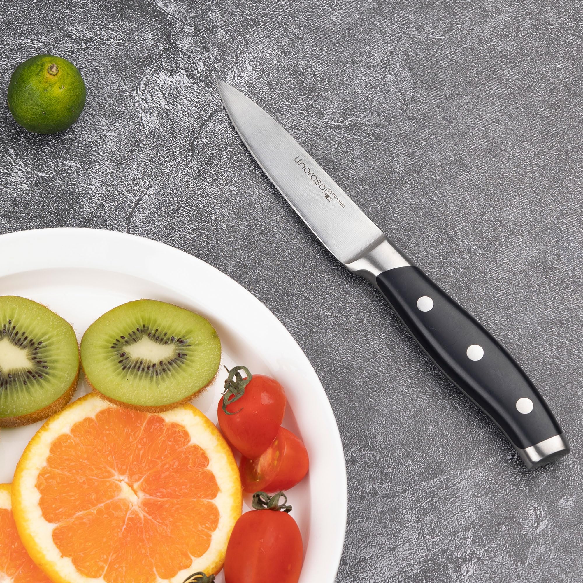 Linoroso Classic paring knife garnishing precision during food prep.