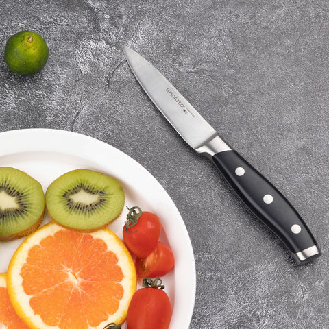 Linoroso Classic paring knife garnishing precision during food prep.