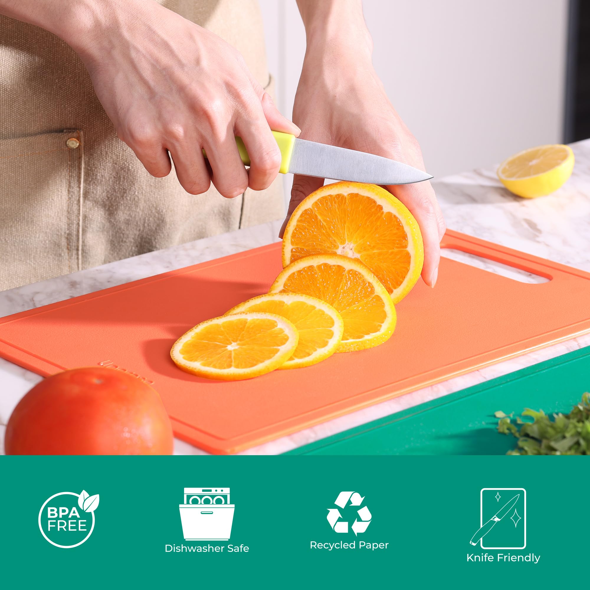 Linoroso multicolor cutting boards organized by color for varied foods.