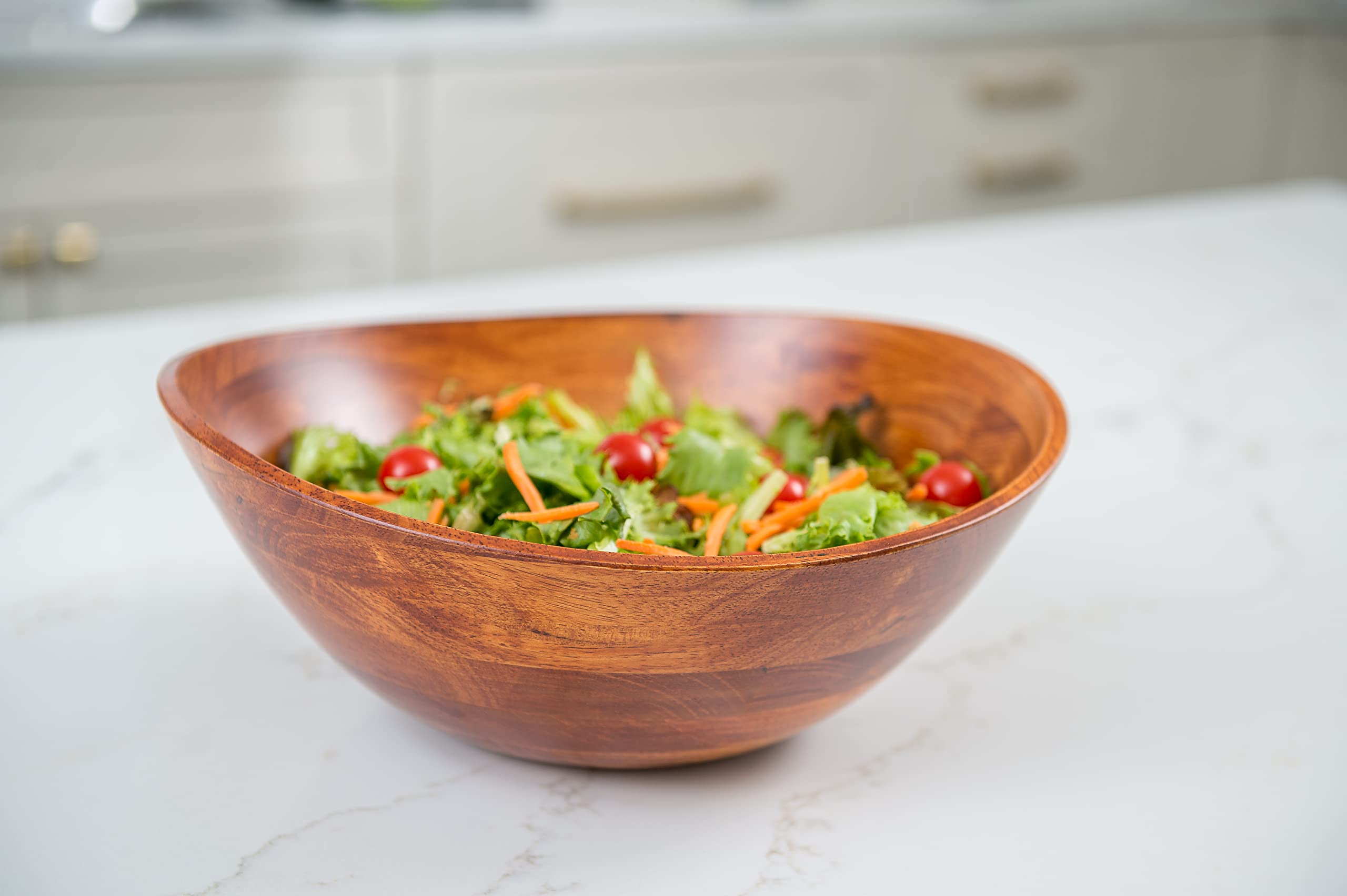 Lipper International 294 cherry finished wavy rim bowl shadowed to highlight depth.