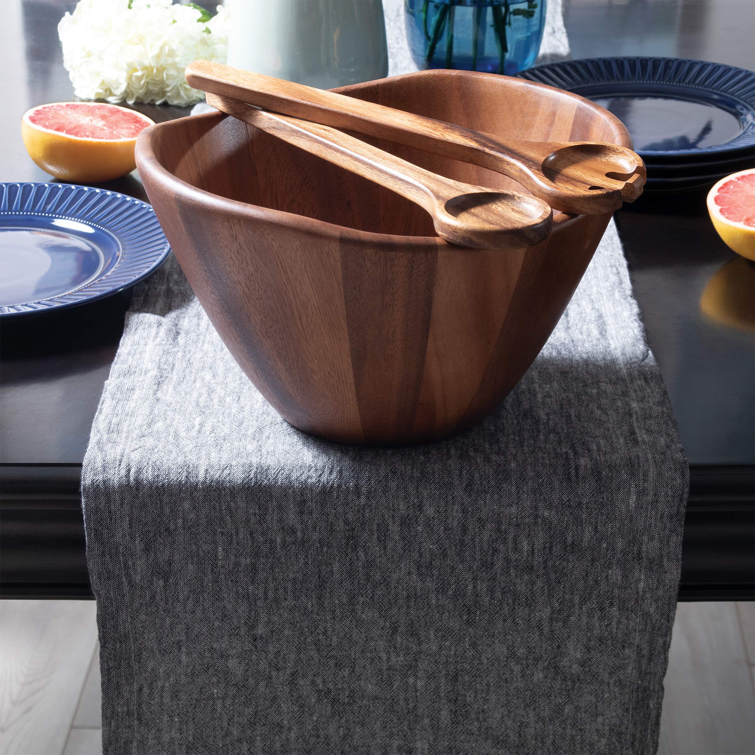 Lipper International Acacia Wave Bowl with servers enables graceful serving.