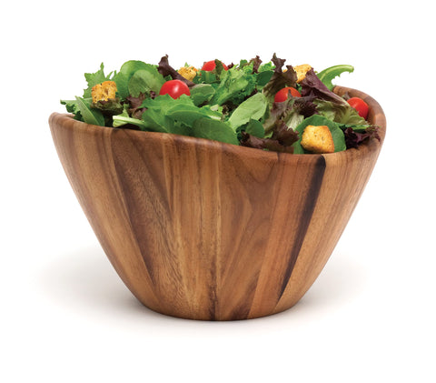 Lipper International Acacia Wave Bowl serves as a stylish centerpiece.