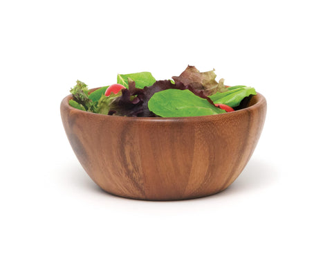 Lipper International acacia round flair bowl on the table as decorative dining piece.