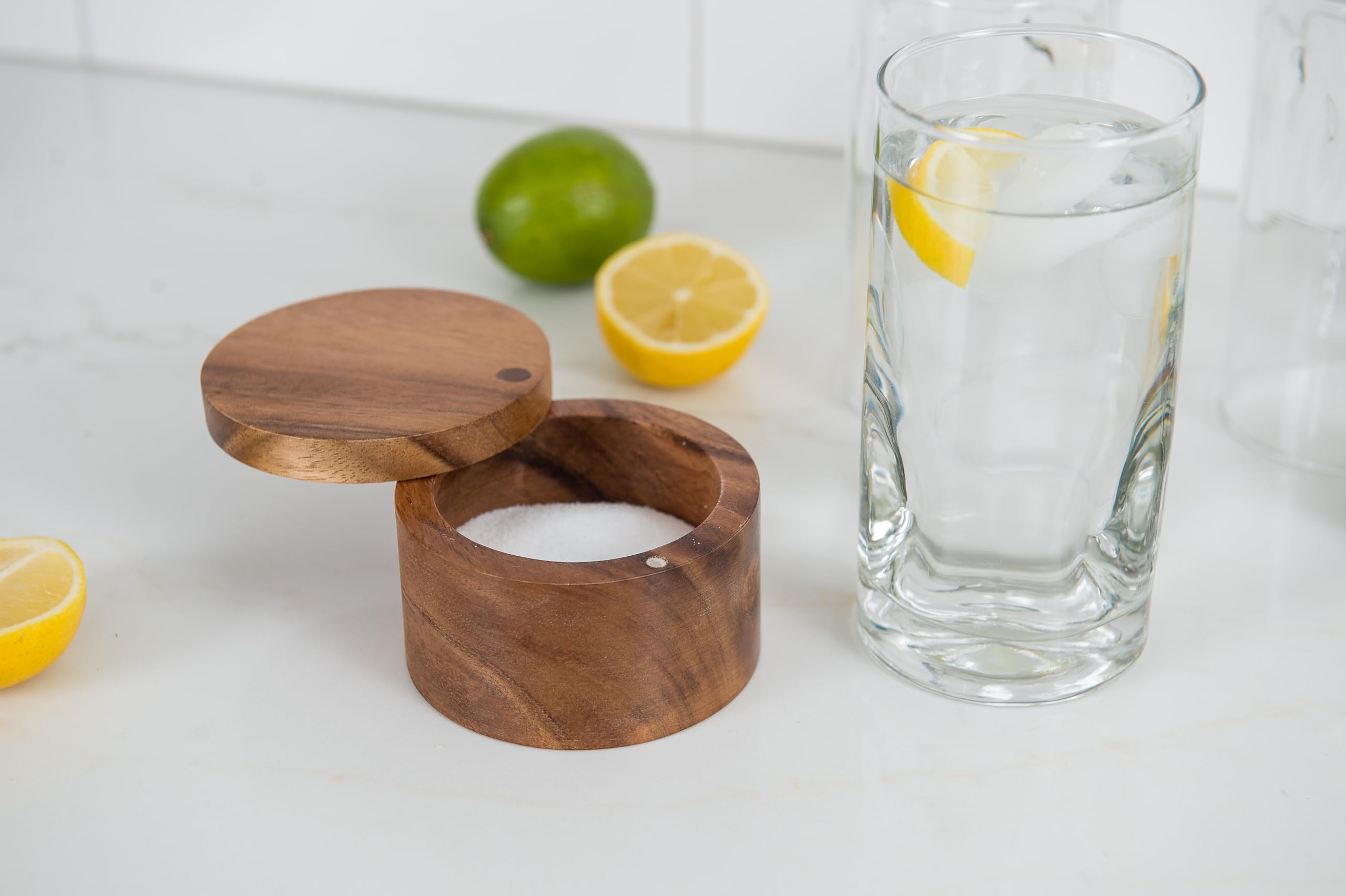 Lipper International Acacia Salt Box shown with small items for versatile storage.