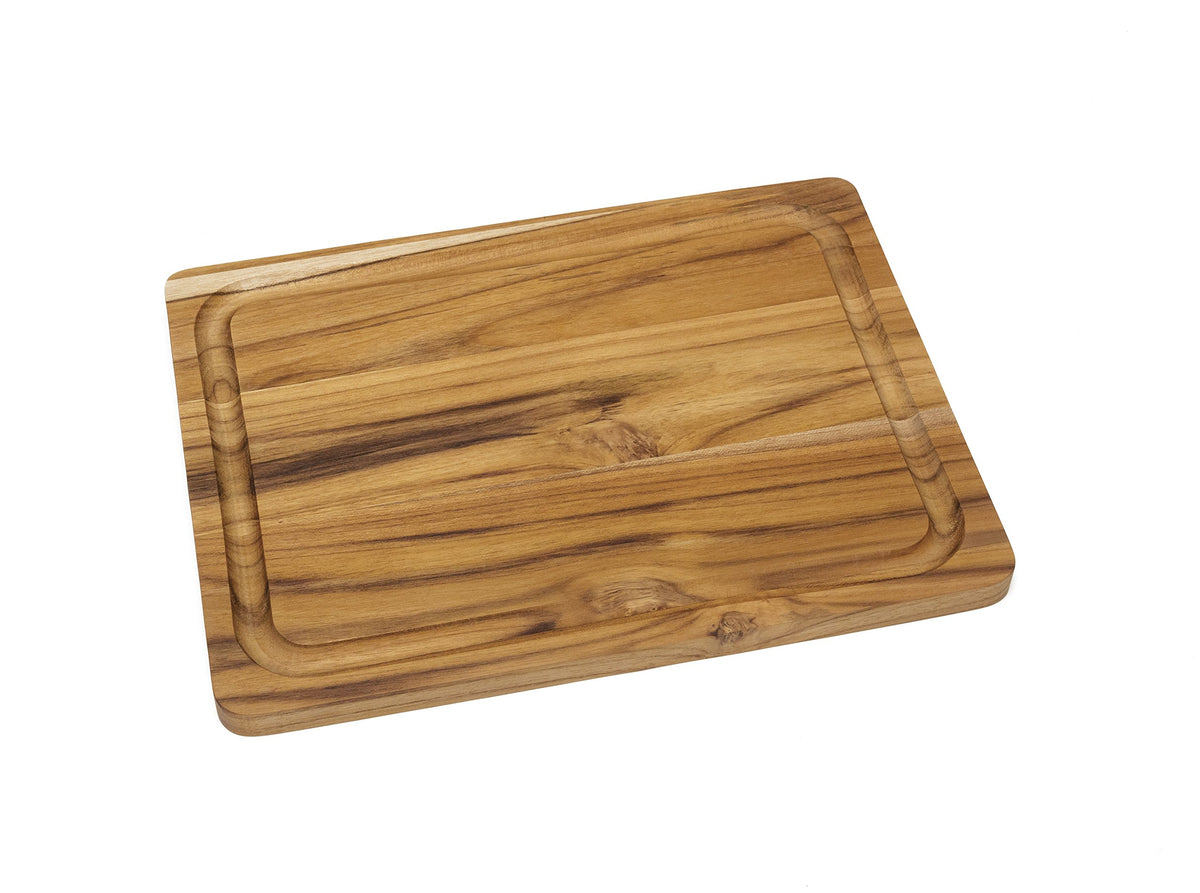 Lipper International teak cutting board with juice groove, perfect for prep and serving